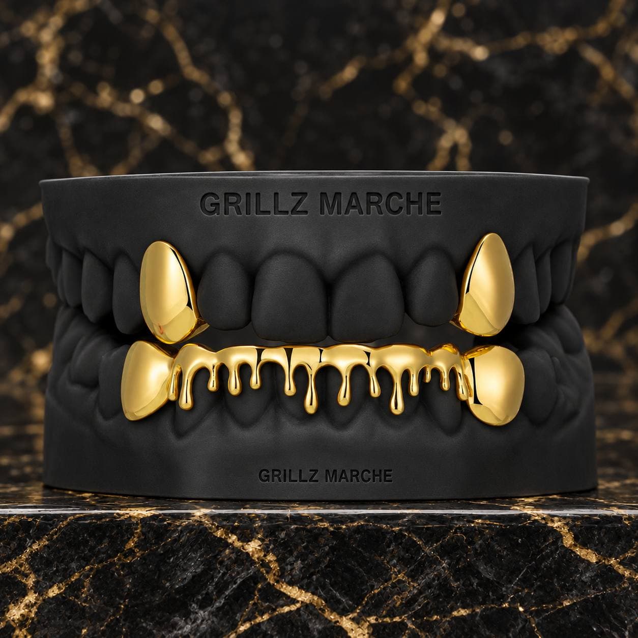 Drip con zanne: grillz su misura su 10 denti, finitura PVD effetto oro