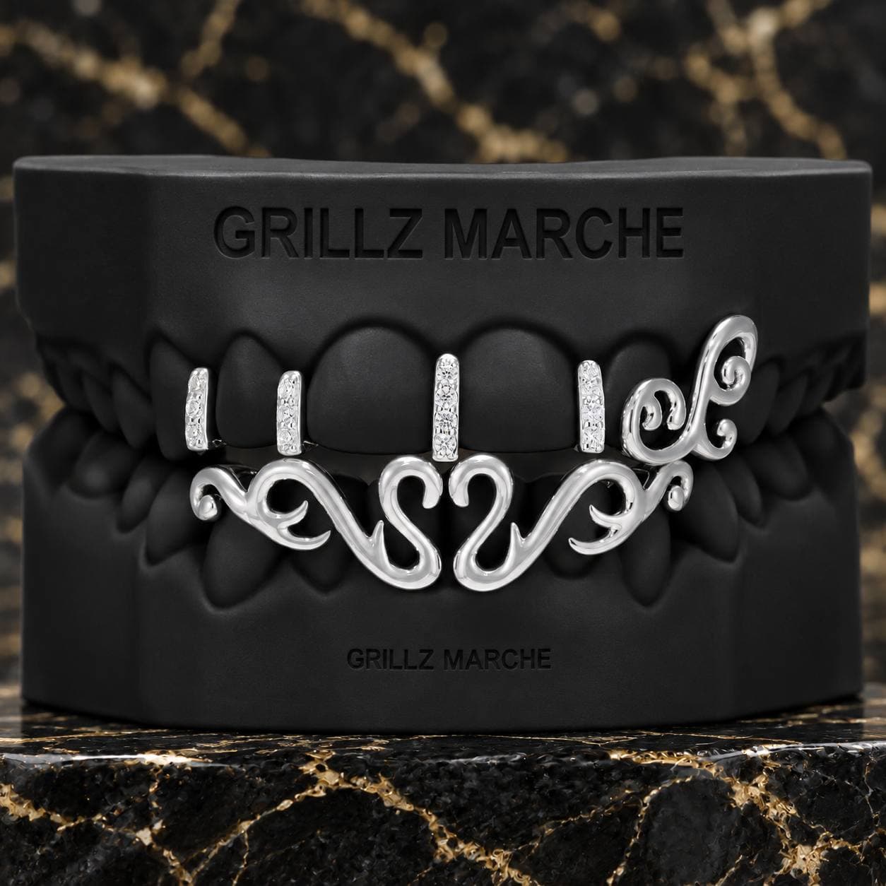 Volute: grillz con pietre su misura su 12 denti, cromo-cobalto lucidato a specchio
