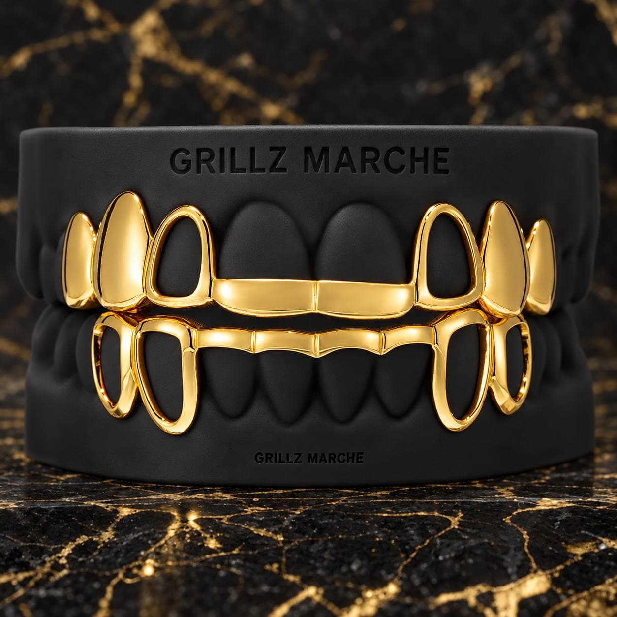 Barra e open face: grillz su misura su 16 denti, finitura PVD effetto oro